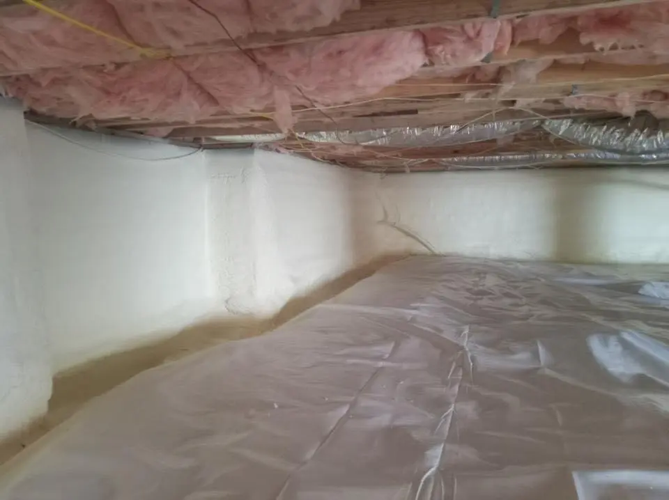 Crawl space encapsulation with closed-cell spray foam for Commercial Roof Restoration in St. Charles